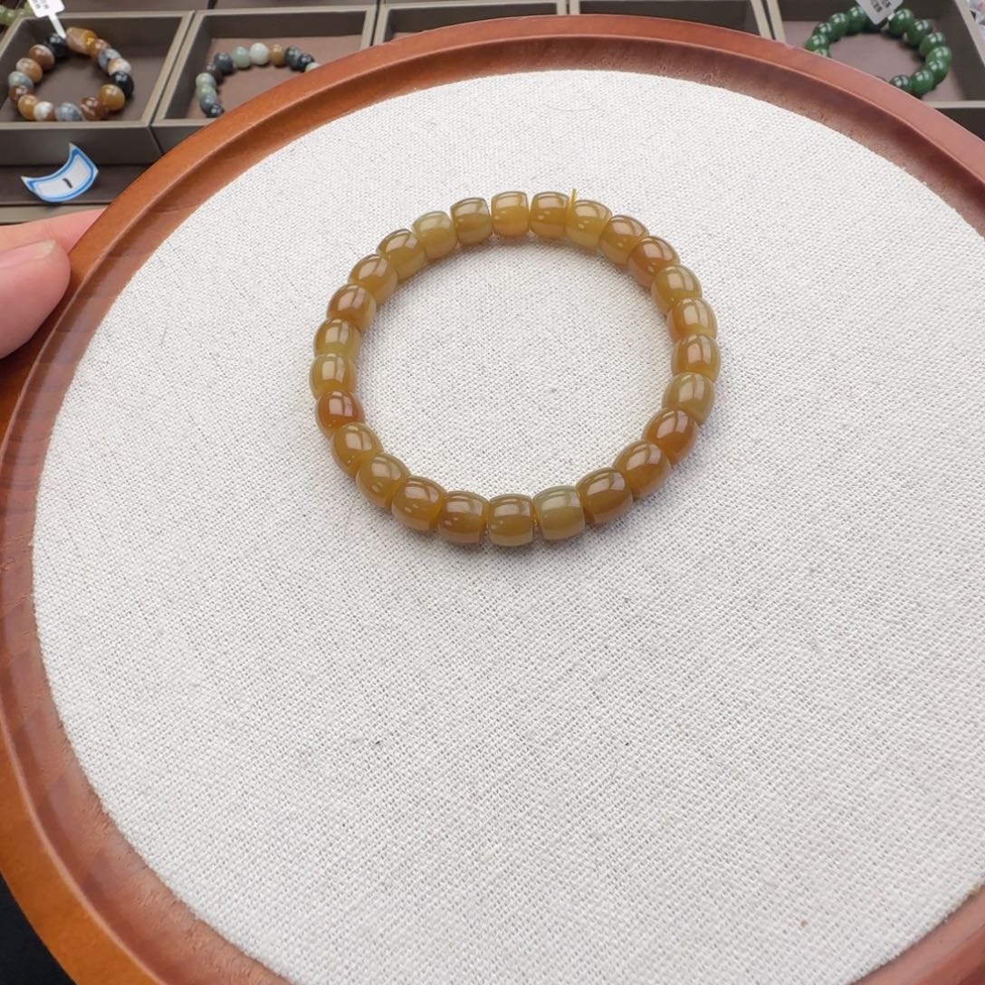 夜****和田玉未镶嵌手链卡8且末金山糖直切，39