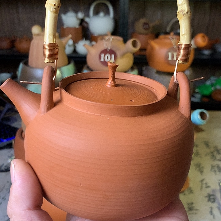 杨***姐提梁砂铫壶，朱泥。