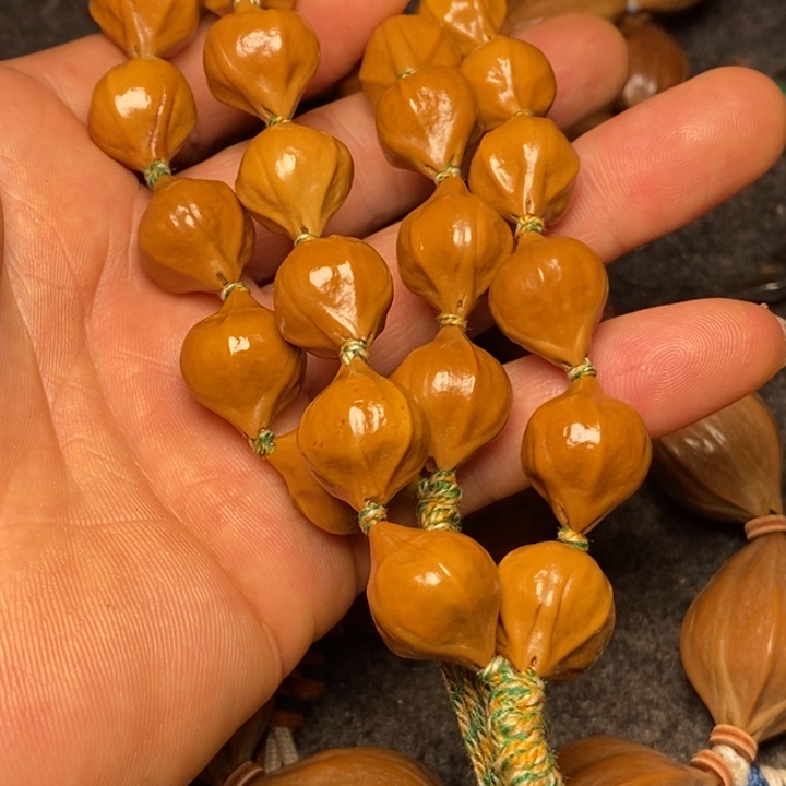 手串橄榄核1.4蒜头40号