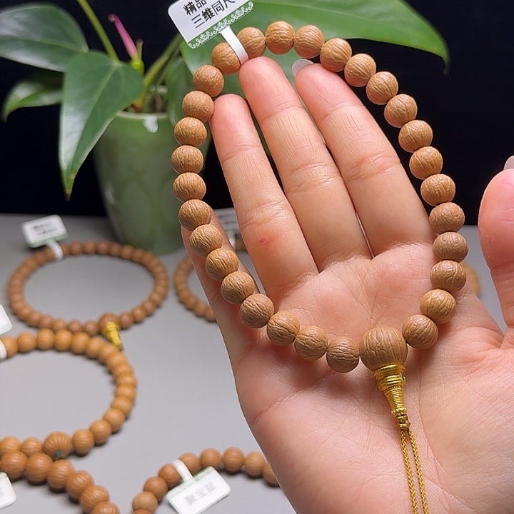 蔡***秋猴头核桃吊坠凤羽