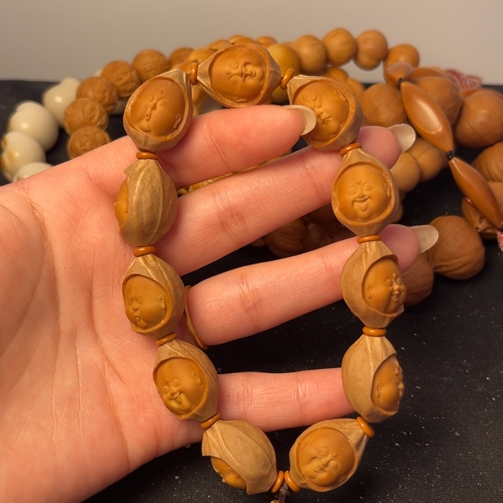 手串橄榄核包衣百态