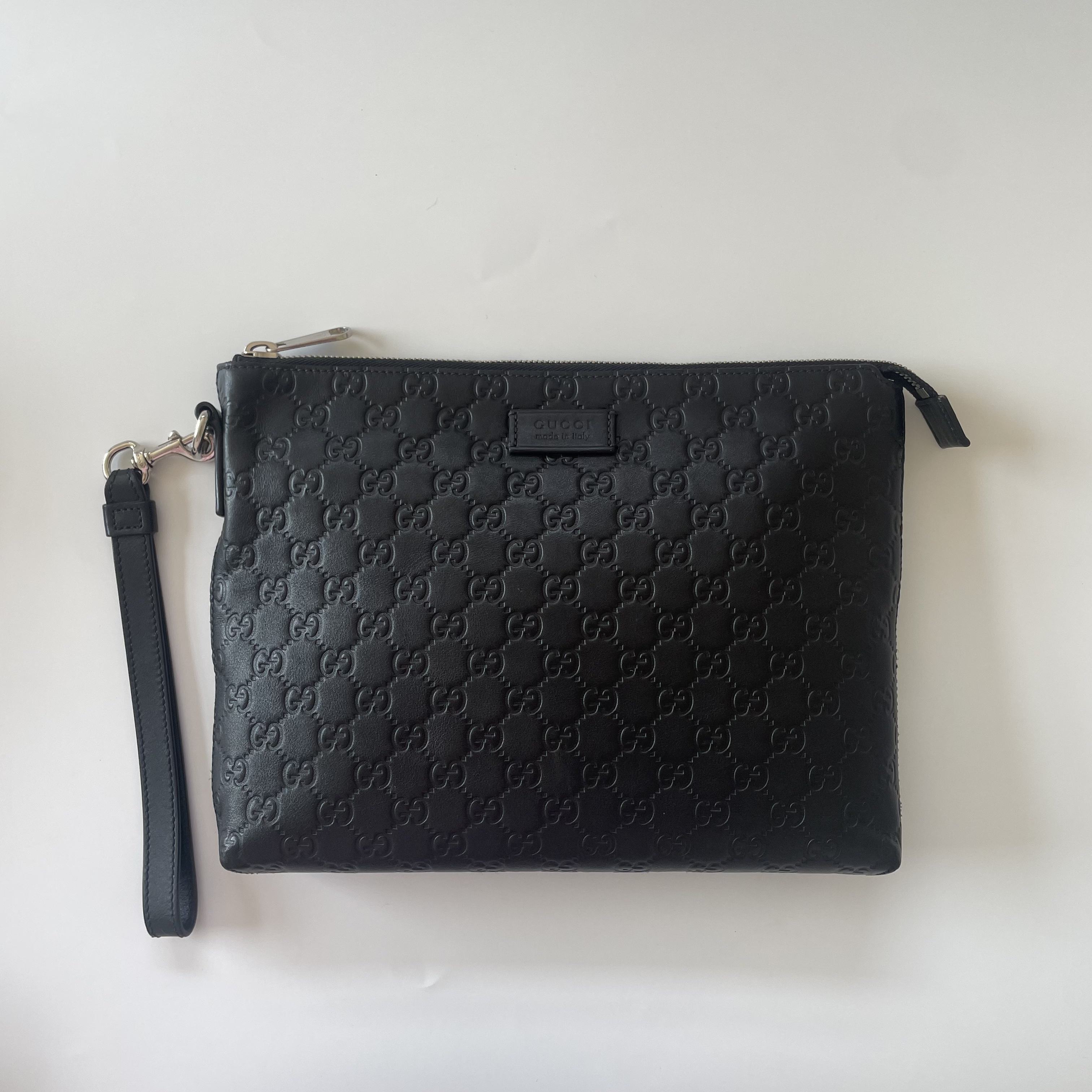 99新 GUCCI/古驰 古驰全皮压纹手拿包234-30/23/4