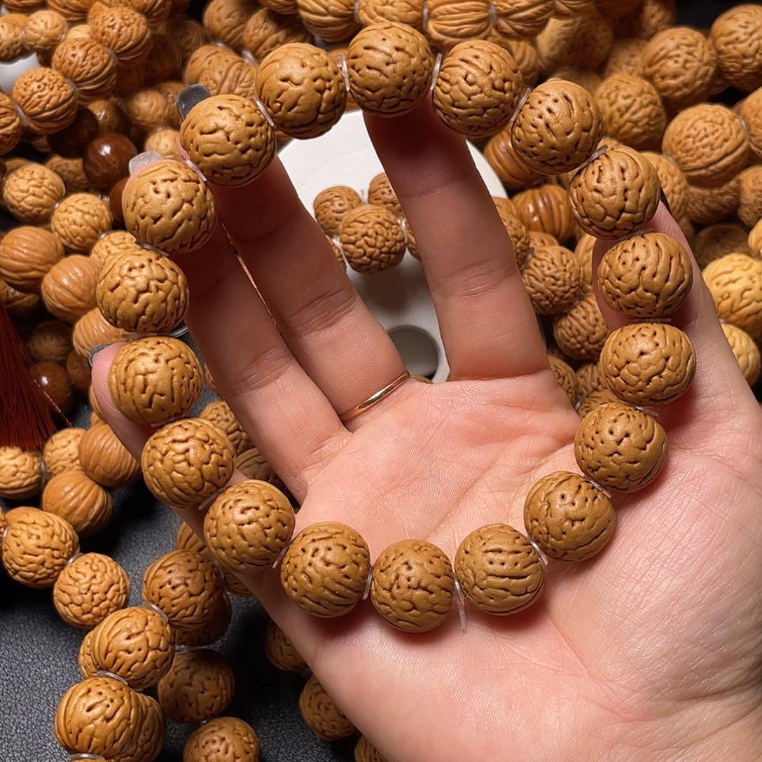 皂***活桃核手串金丹手串