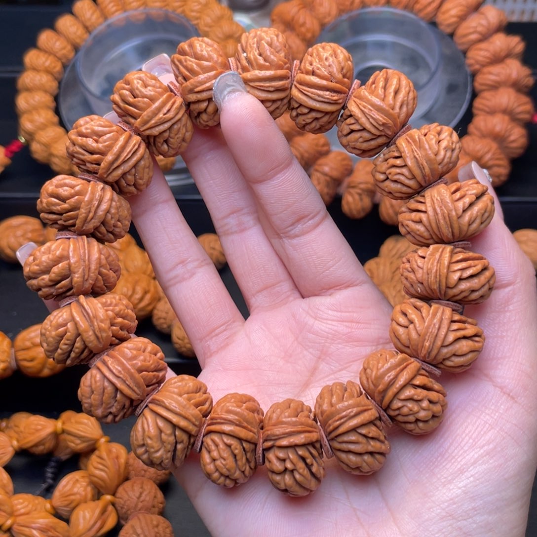 桃核手串23尺寸飞碟刺龙手串（5号链接）