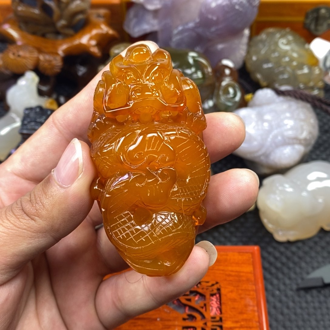 玛瑙/玉髓手把件未镶嵌永**弃