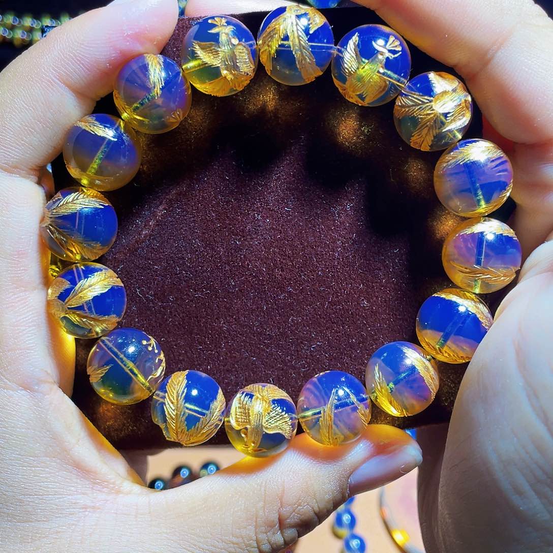 蓝珀裸石未镶嵌昵****的异色珀13凤珠手串