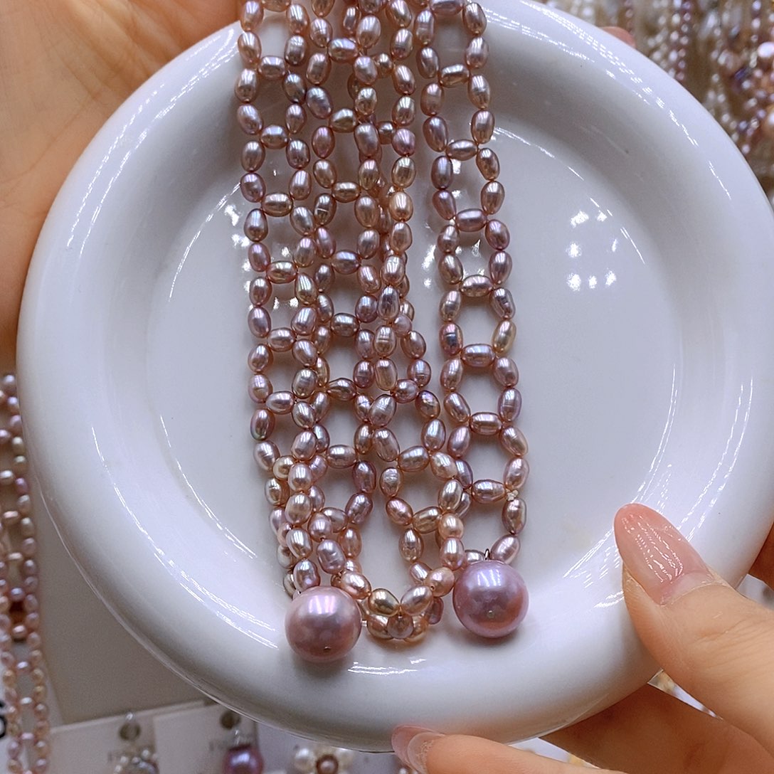 胡***妞耳饰银S925镶嵌淡水珍珠