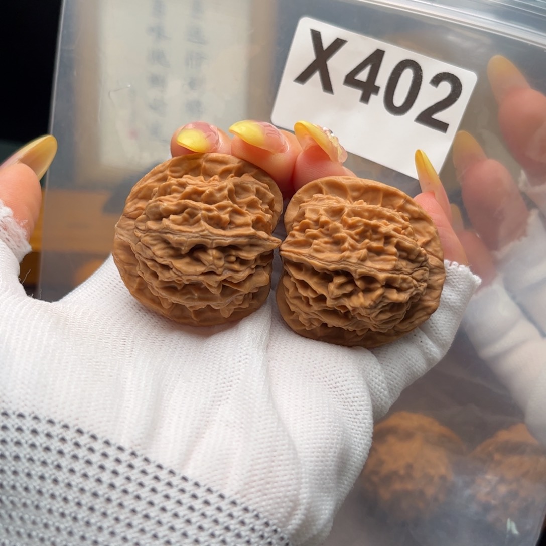 桃核把件40左右天地x402