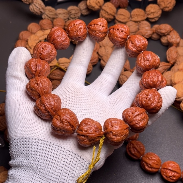 叶***凡手串文玩核桃桃心装