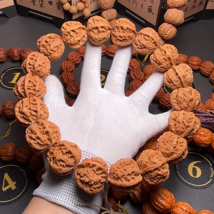 郑***堂文玩核桃手串火焰八棱