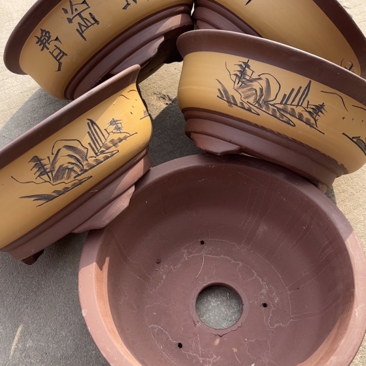 紫砂花盆100-4。        33-14黄