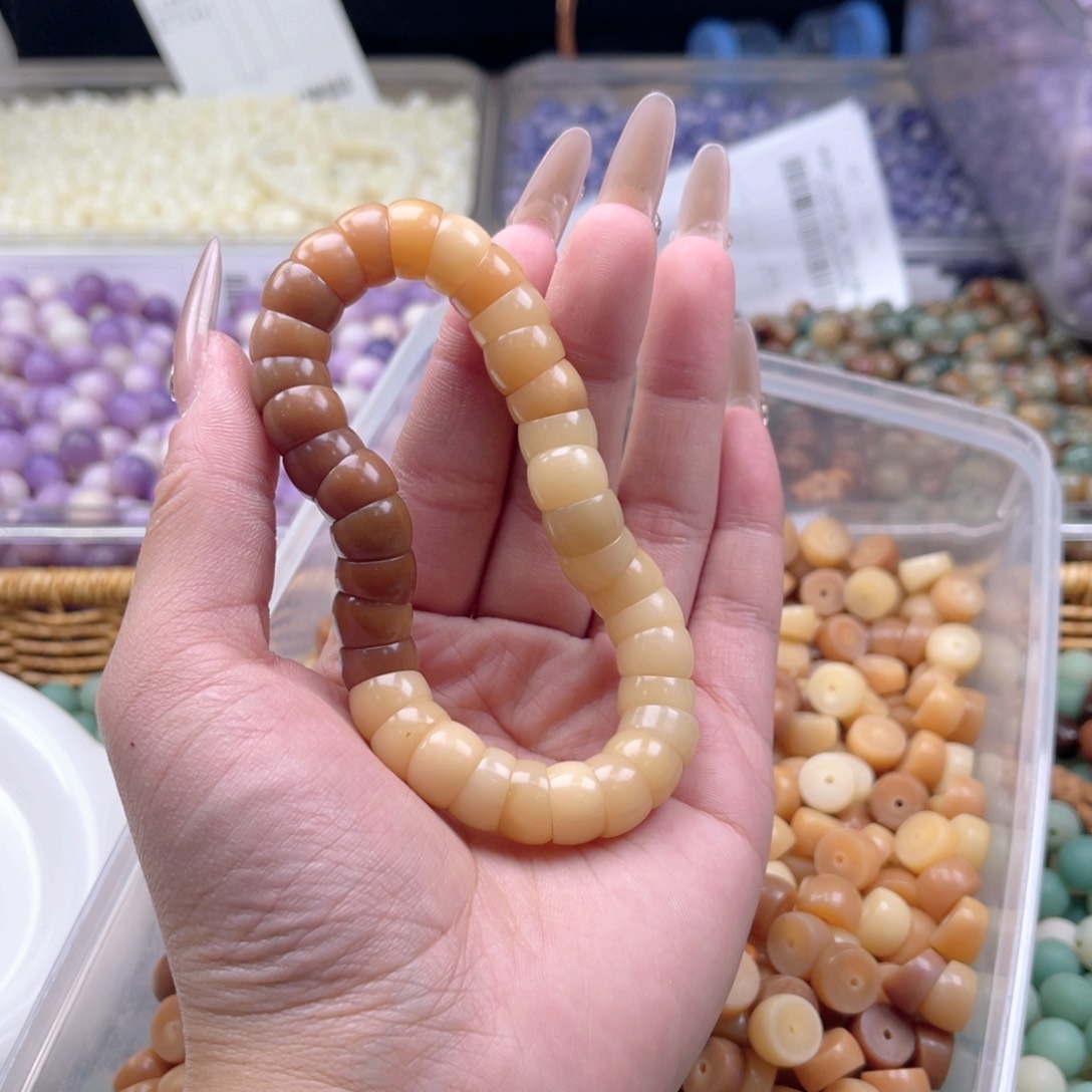 白玉菩提吊坠z11-12mm108颗。太妃糖大肠微瑕