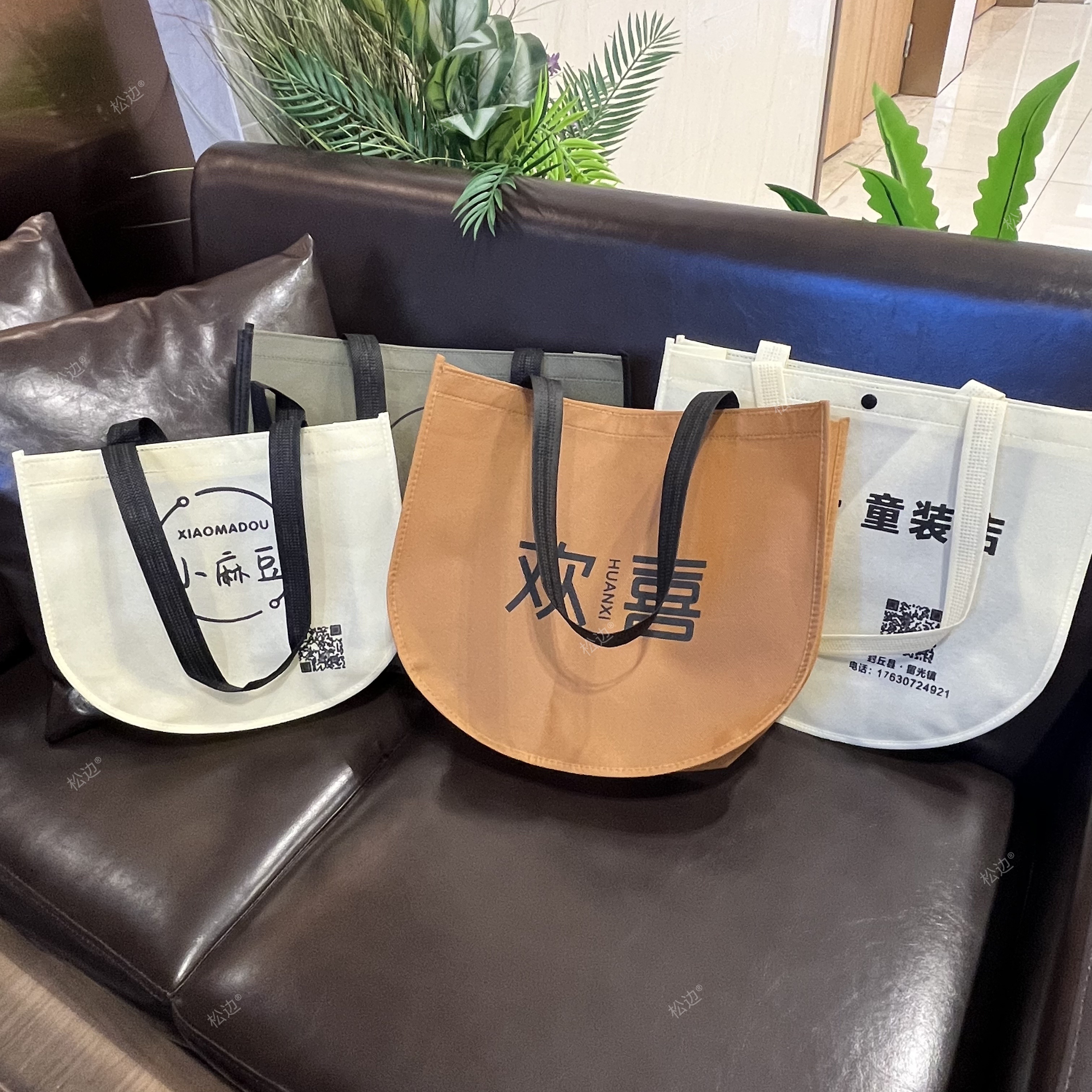 无纺布袋定制服装店手提袋女装月亮袋环保袋印logo圆底水桶袋定做