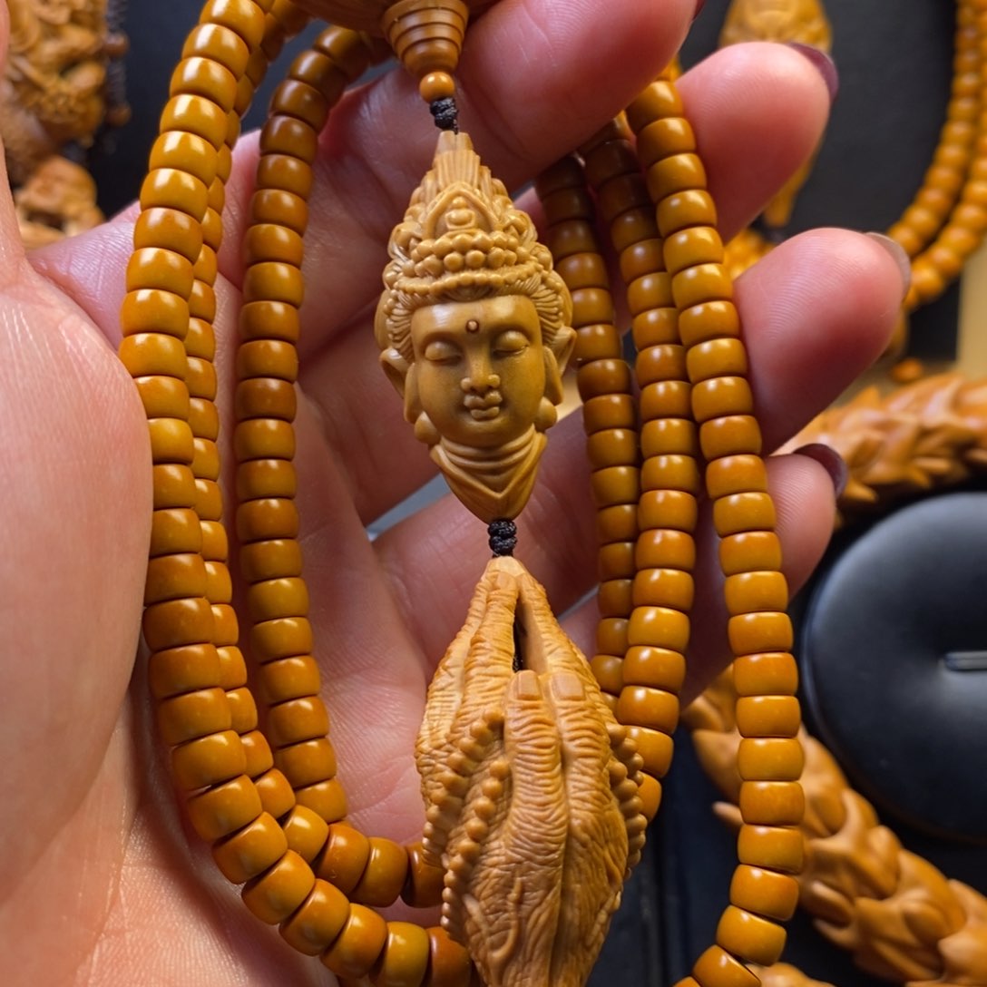 橄榄核手串观音脖挂