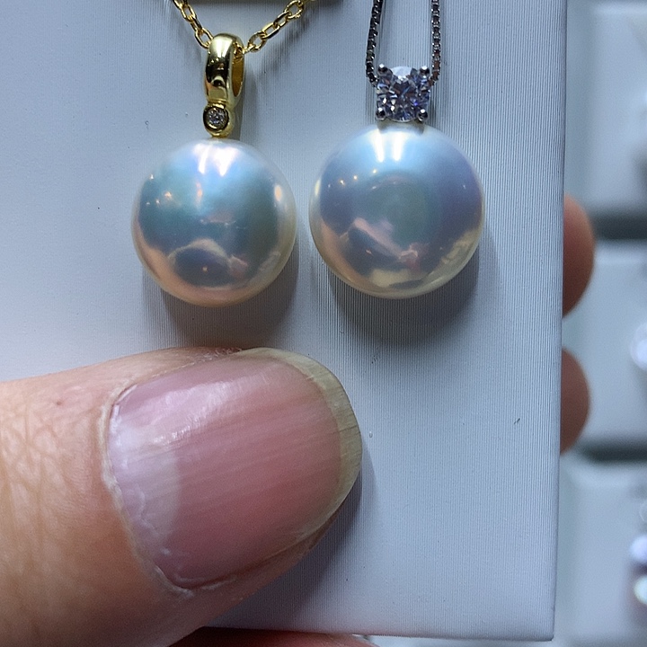 王***橙淡水珍珠巴洛克银S925镶嵌