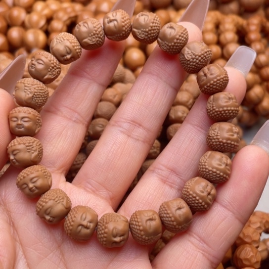 猴头核桃手串石**转宝宝佛