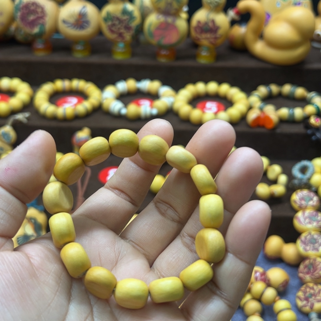 ****子草里金水滴扁15颗手串