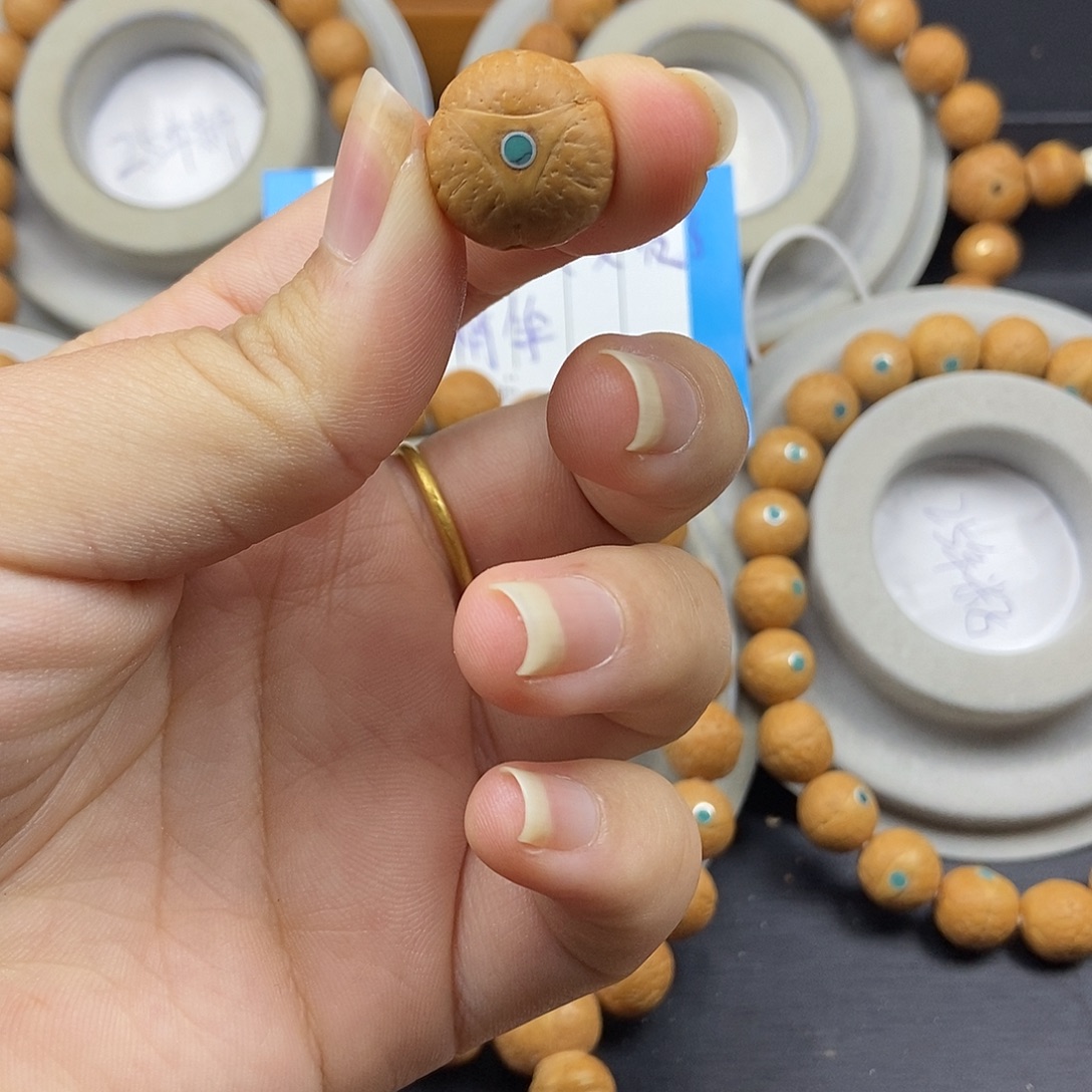 手串凤眼菩提龙眼镶嵌三通