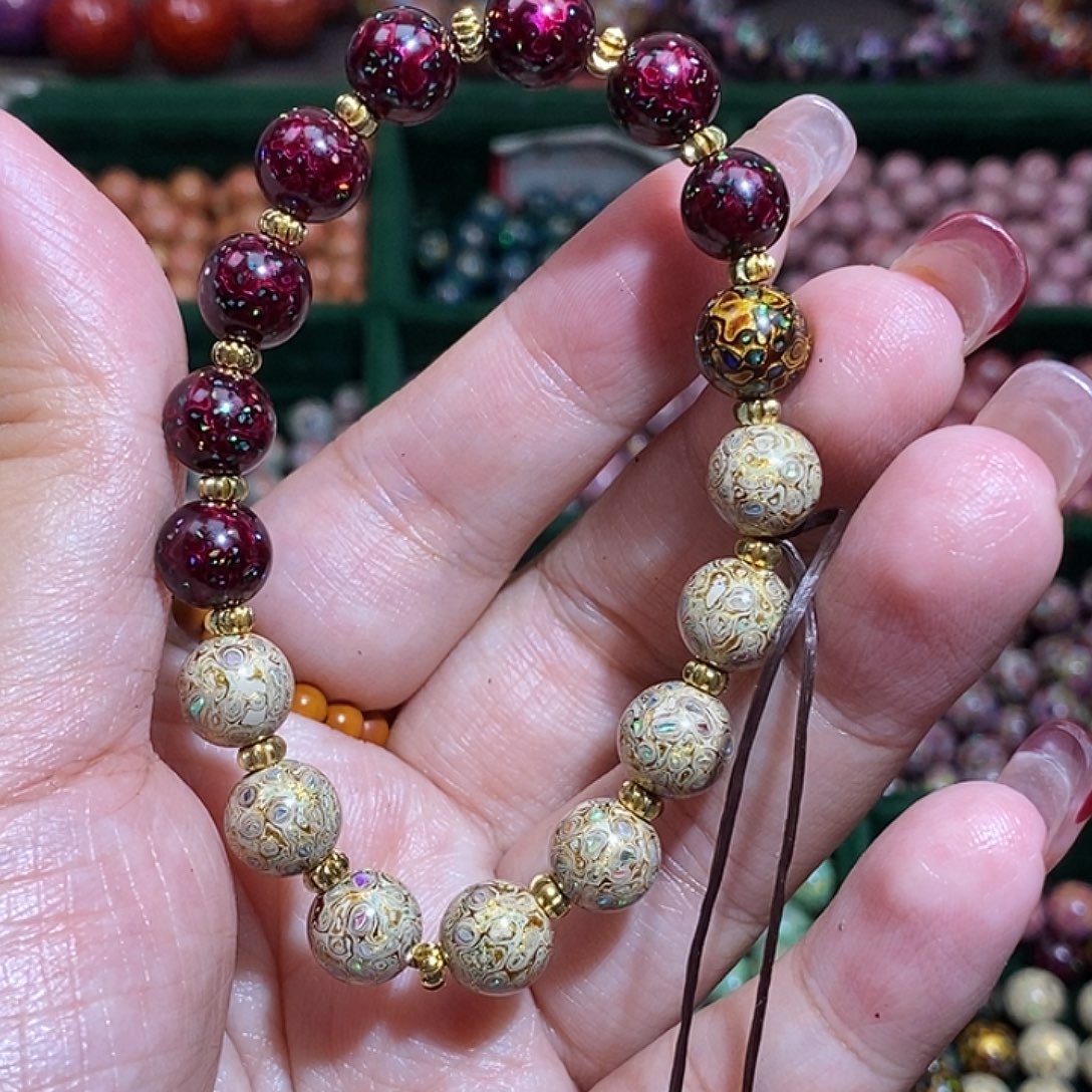 萌***姨大漆珠0.8双色手串