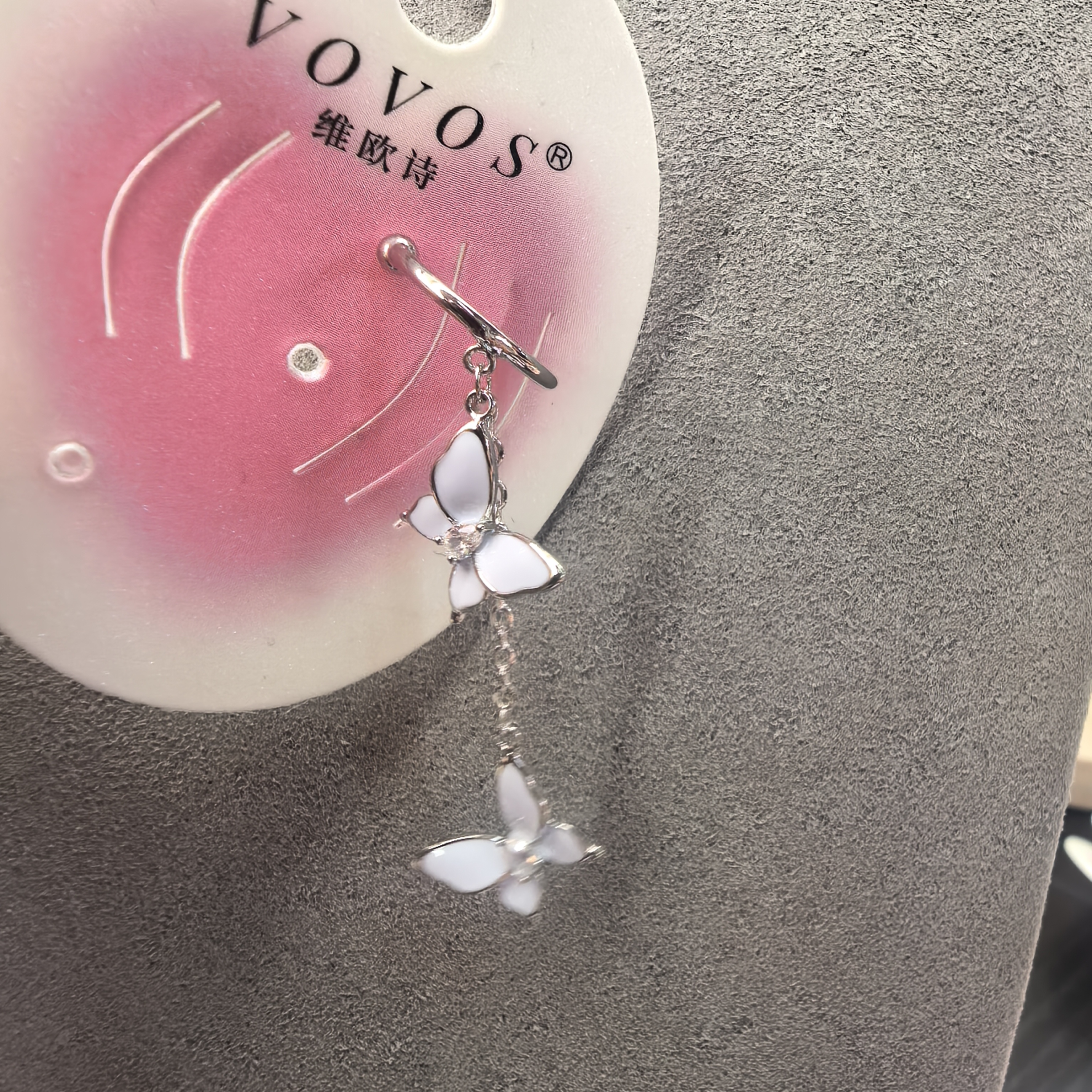 F865紫色流苏蝴蝶结耳骨夹左侧