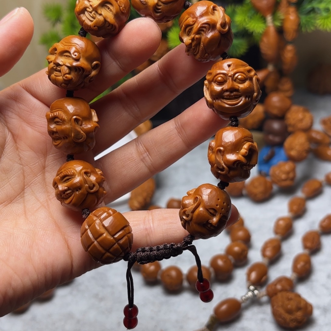妍***甜橄榄核手串/手链殷派罗汉