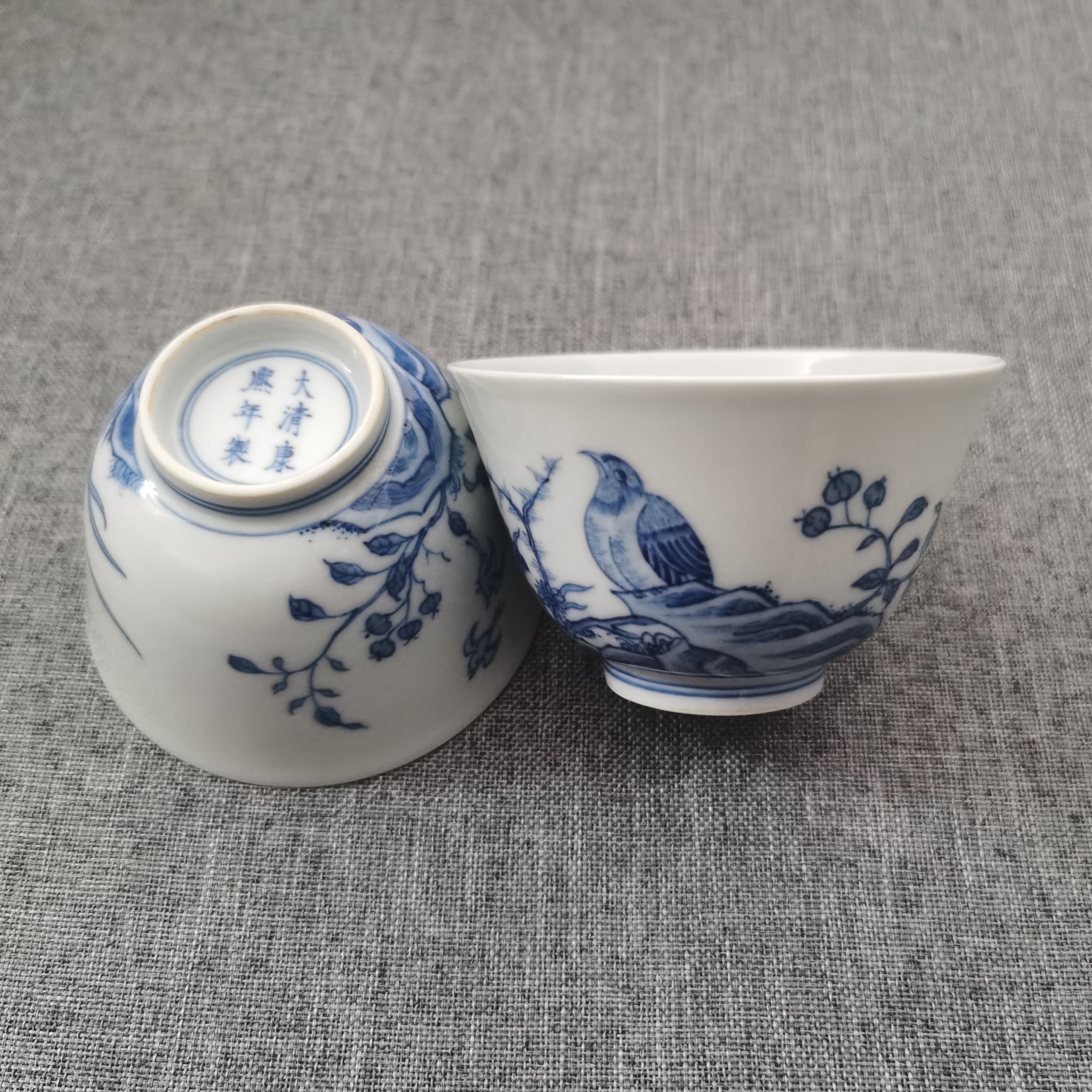 清雍正青花花鸟纹饰主人杯一对