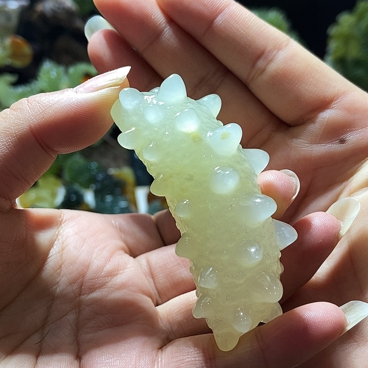 蛇纹石玉手把件合金