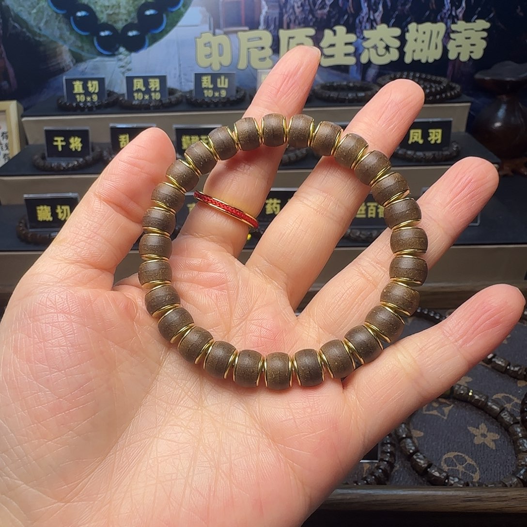 一****椰蒂吊坠印尼原生态椰蒂金盾