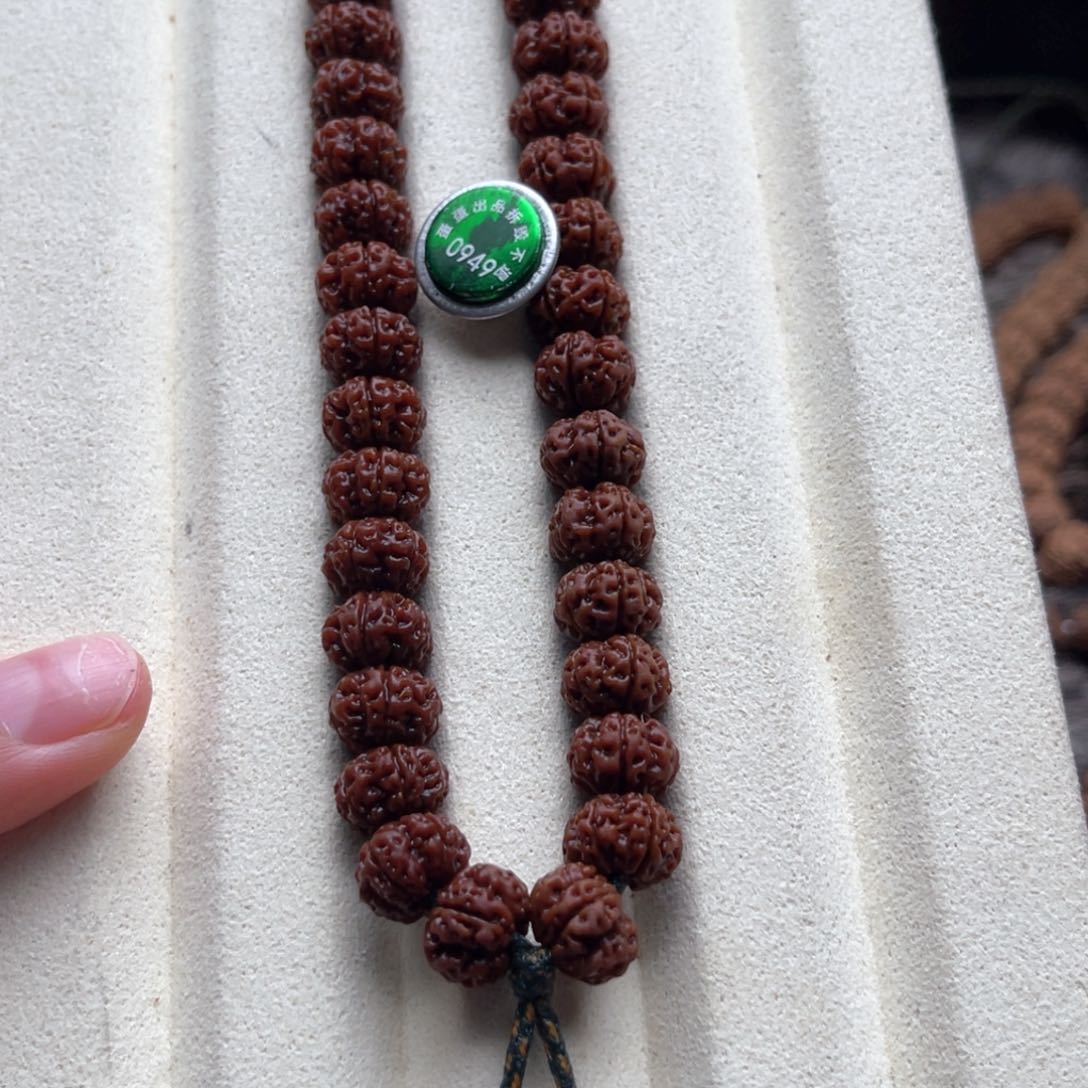 金刚菩提吊坠袖***风凹的梅花