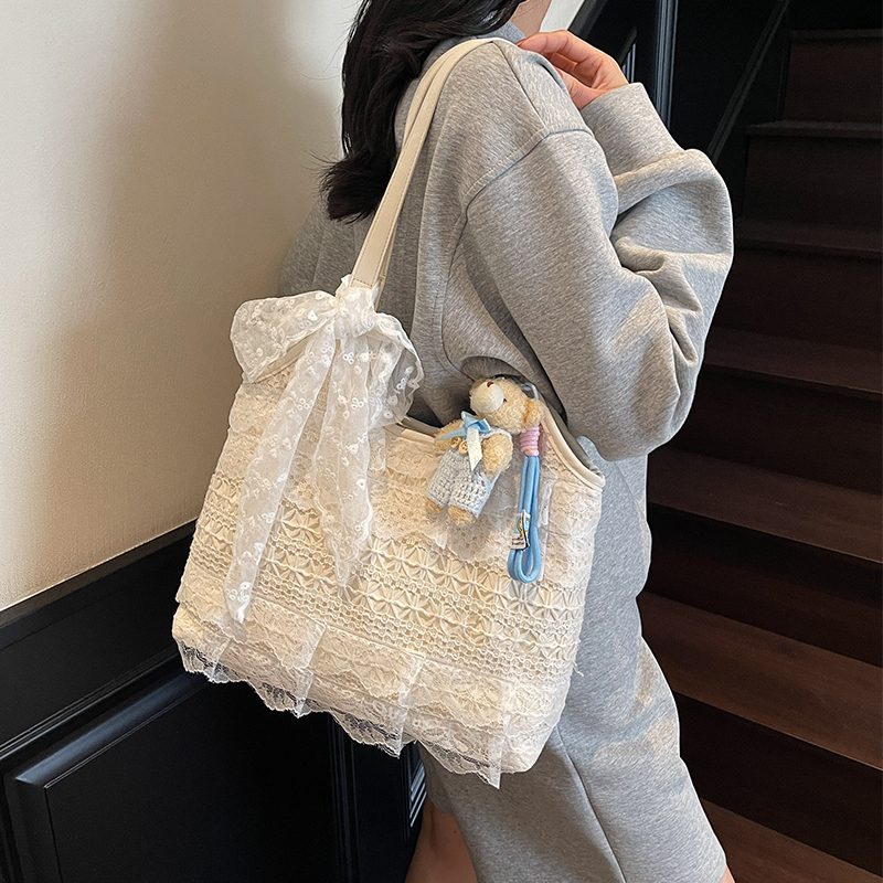 艾米兔女包2025新款甜美简约小众韩版设计休闲通勤日常单肩托特包
