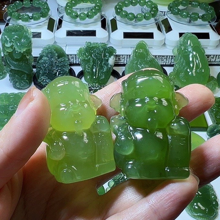 蛇纹石玉手把件未镶嵌玲*