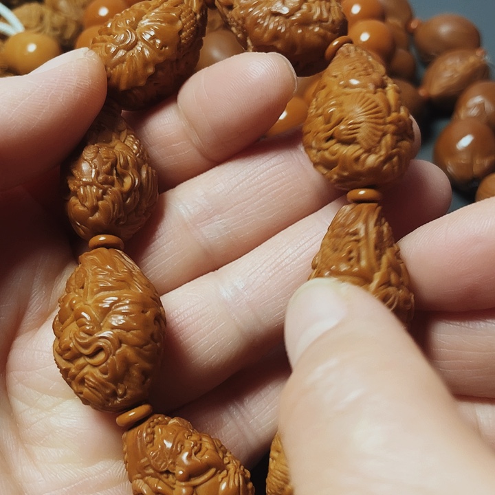 九龙财神，橄榄核雕工艺