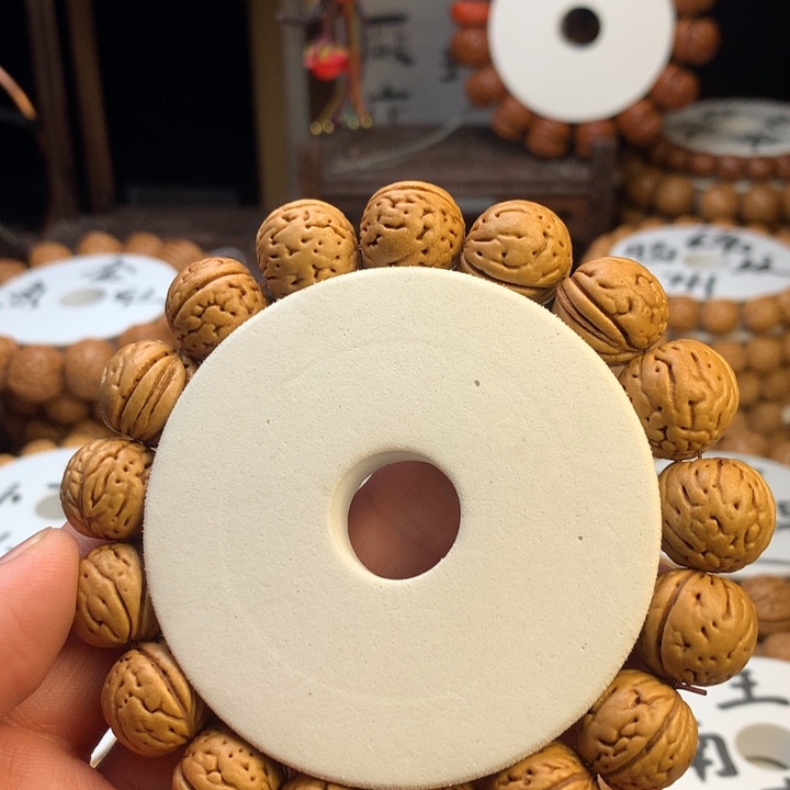 孟***一吊坠桃核野生金丹