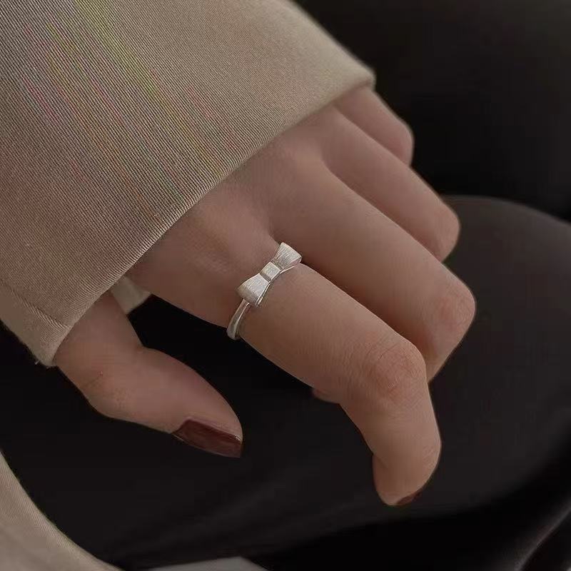 足银戒指 足银s9999 古法蝴蝶结开口戒指