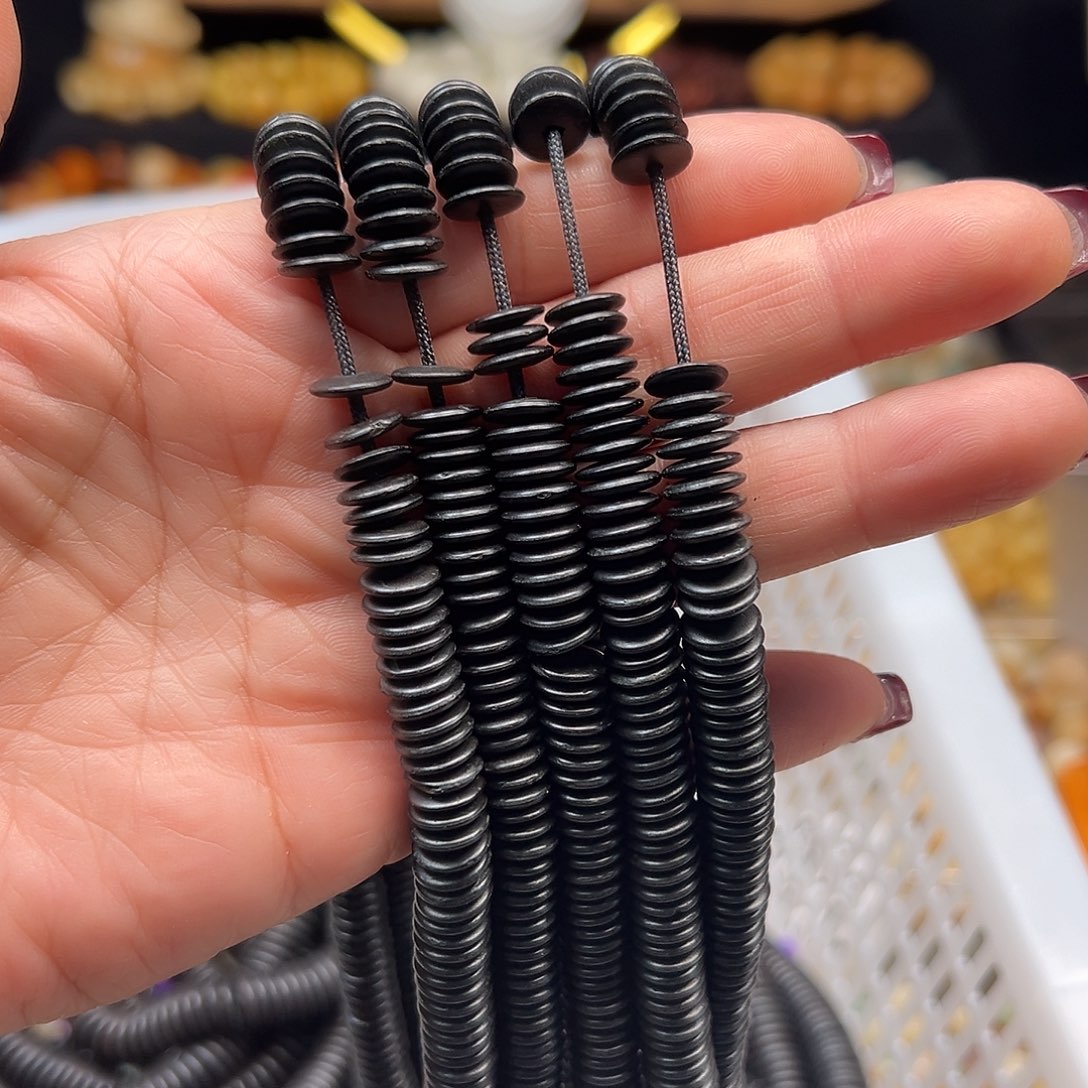 菩提根/象牙果手串卡9黑隔片330左右