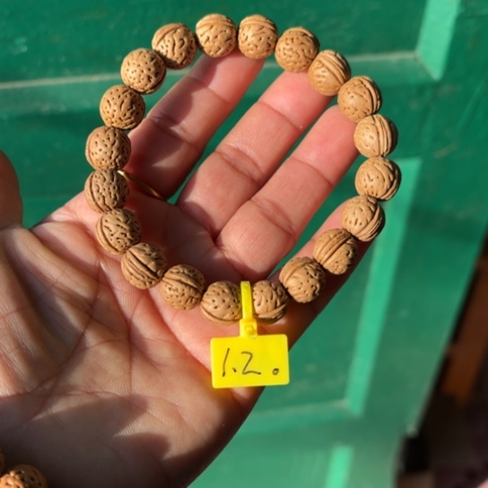 木质野生桃核手串