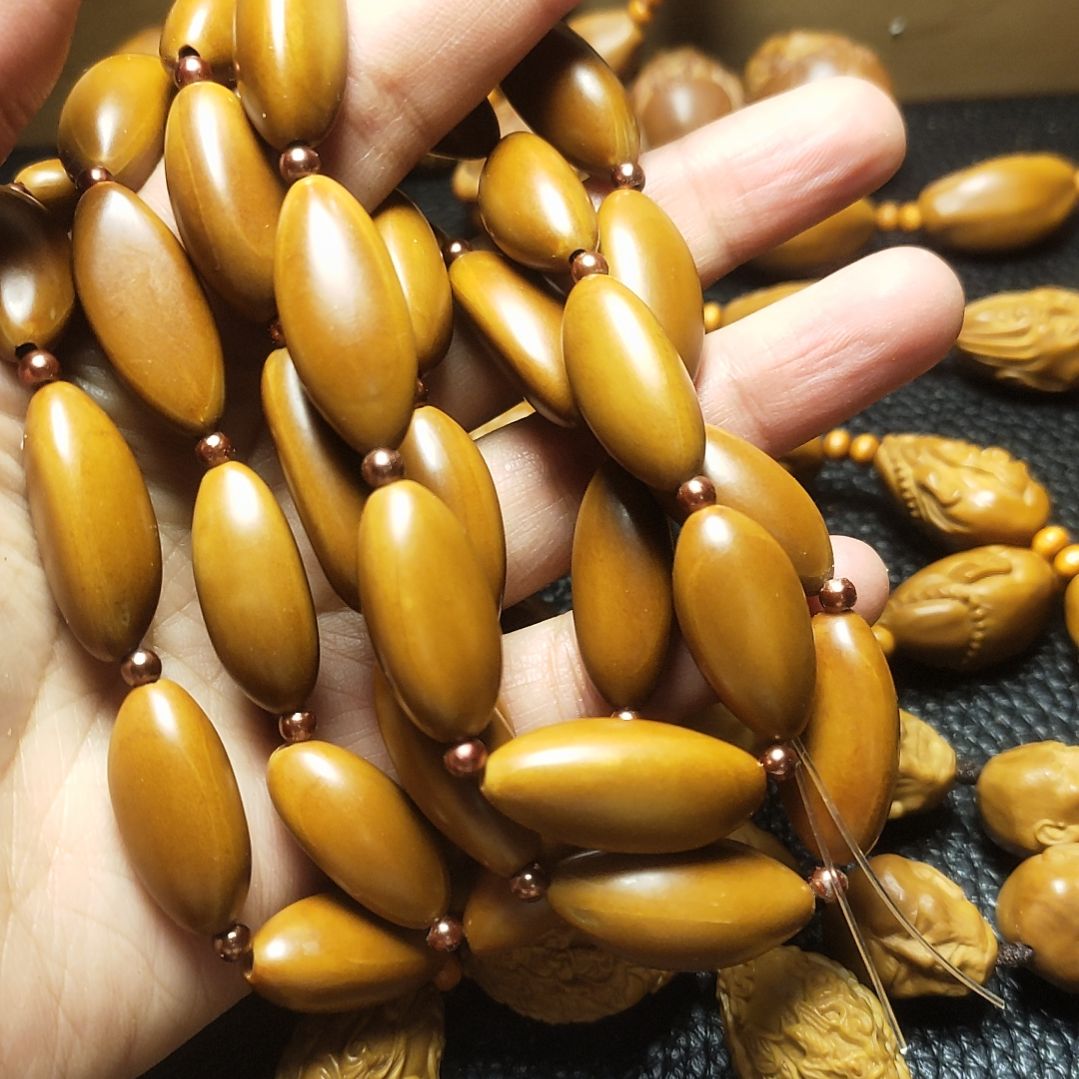 泉***橄榄核吊坠橄榄核