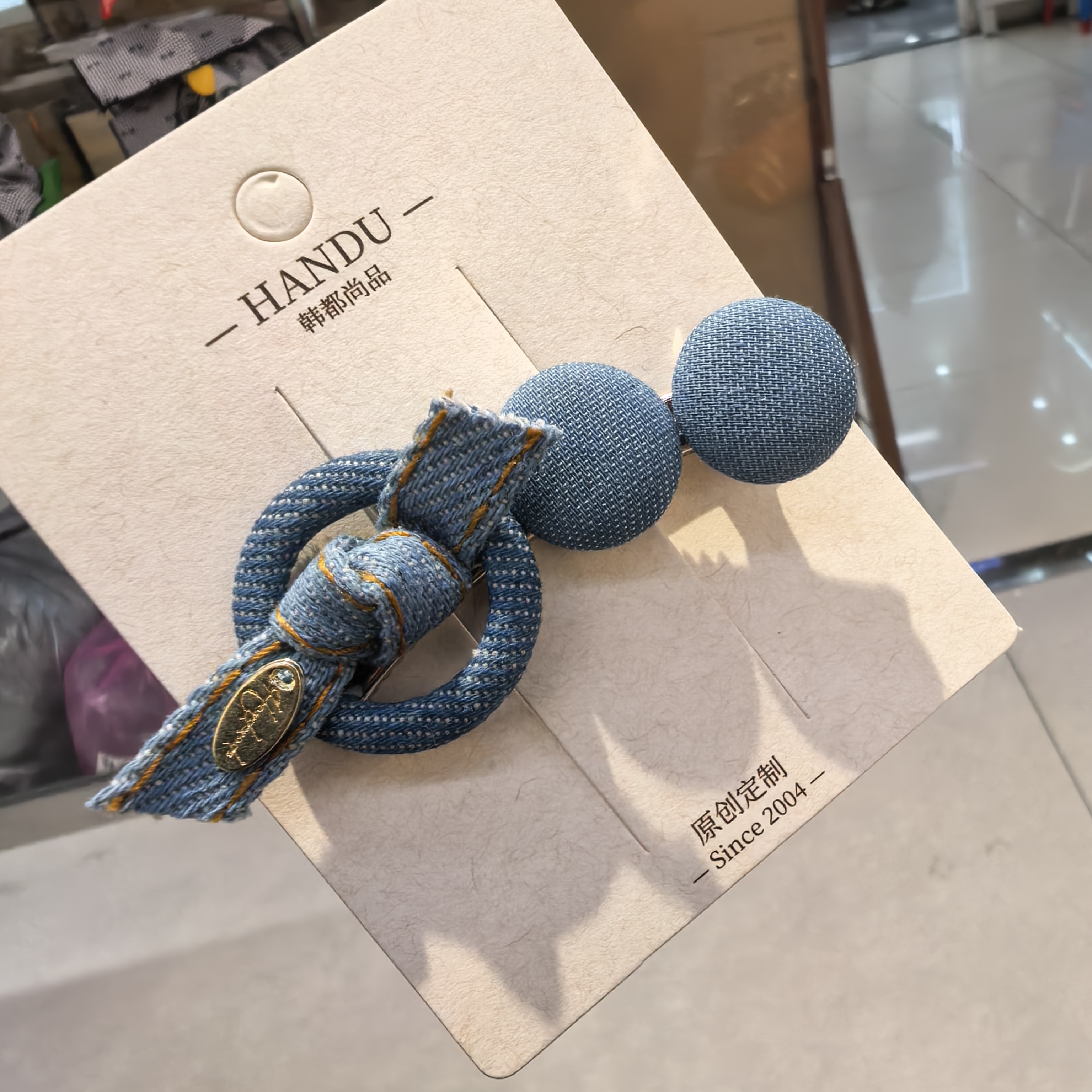 A462蓝色牛仔蝴蝶结圆饼弯刀边夹