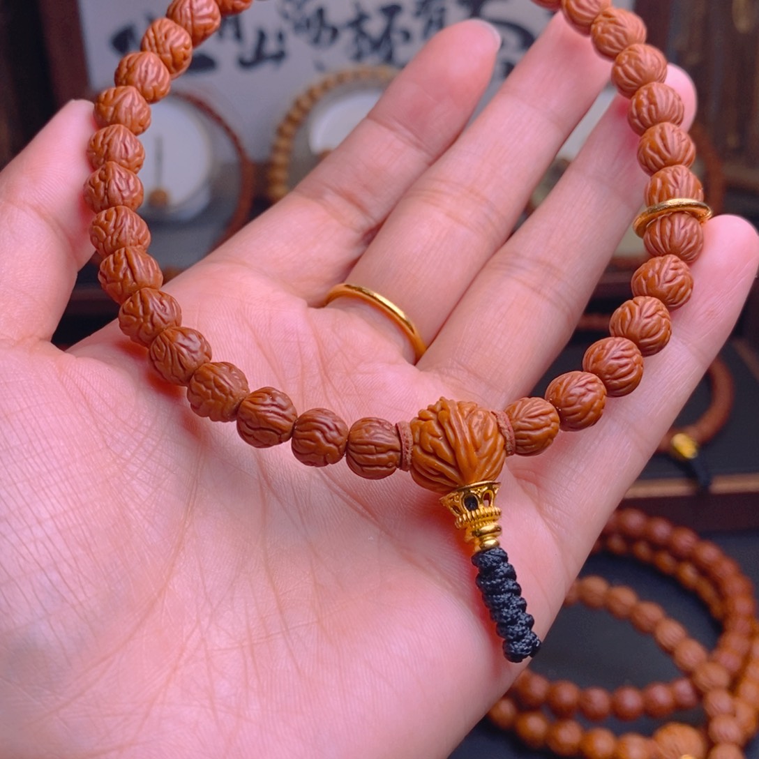 鲁***吼手串桃核龙纹桃核