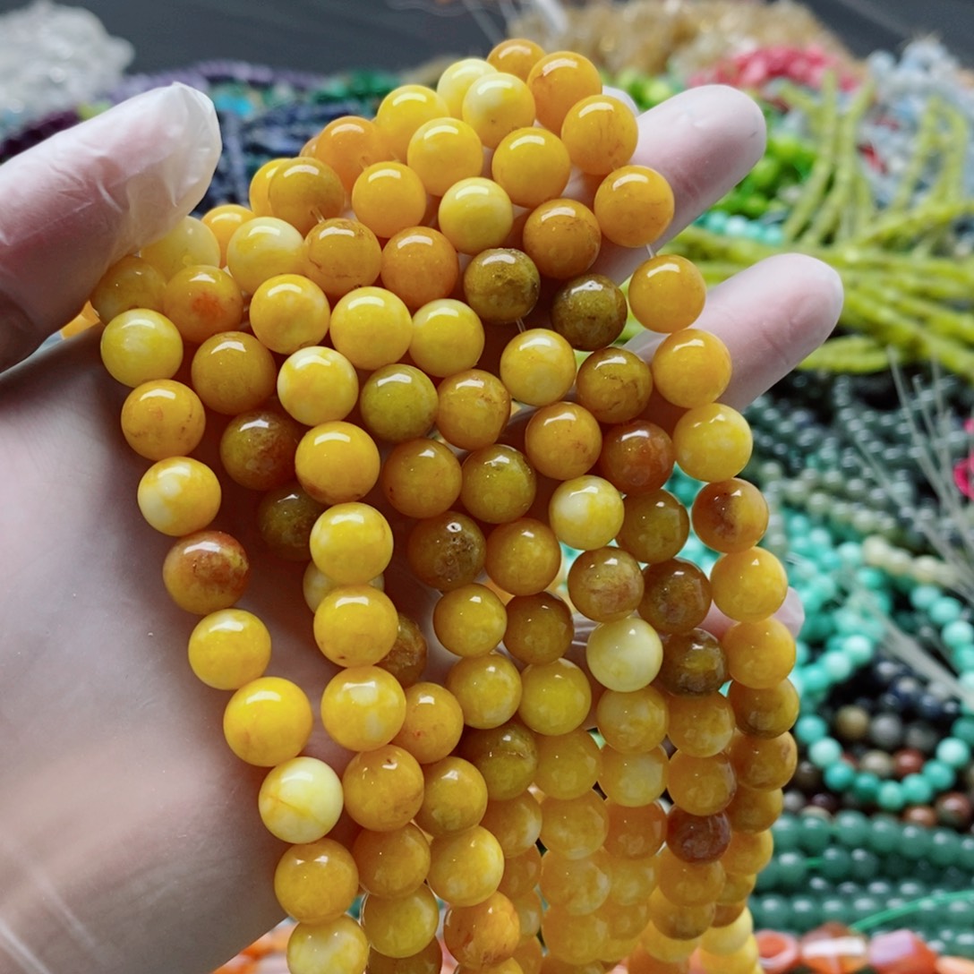 玛瑙/玉髓未镶嵌珠宝半成品一条天然10mm黄玉髓圆珠A101