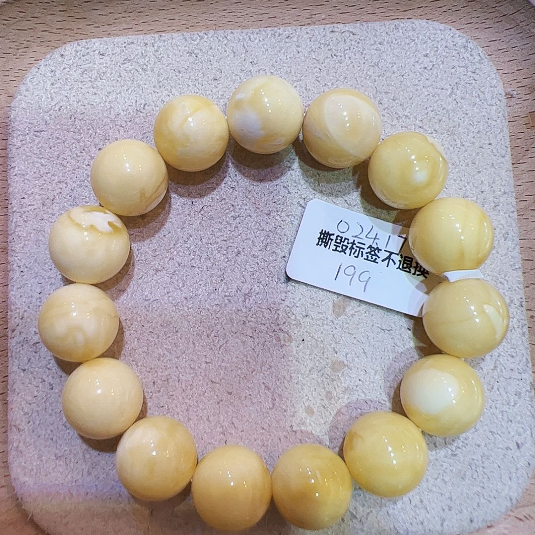 如***！琥珀未镶嵌手链O 24.17 浓蜡圆珠手串