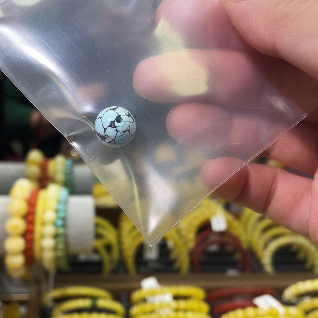 邻***酱木质非金属单珠一颗