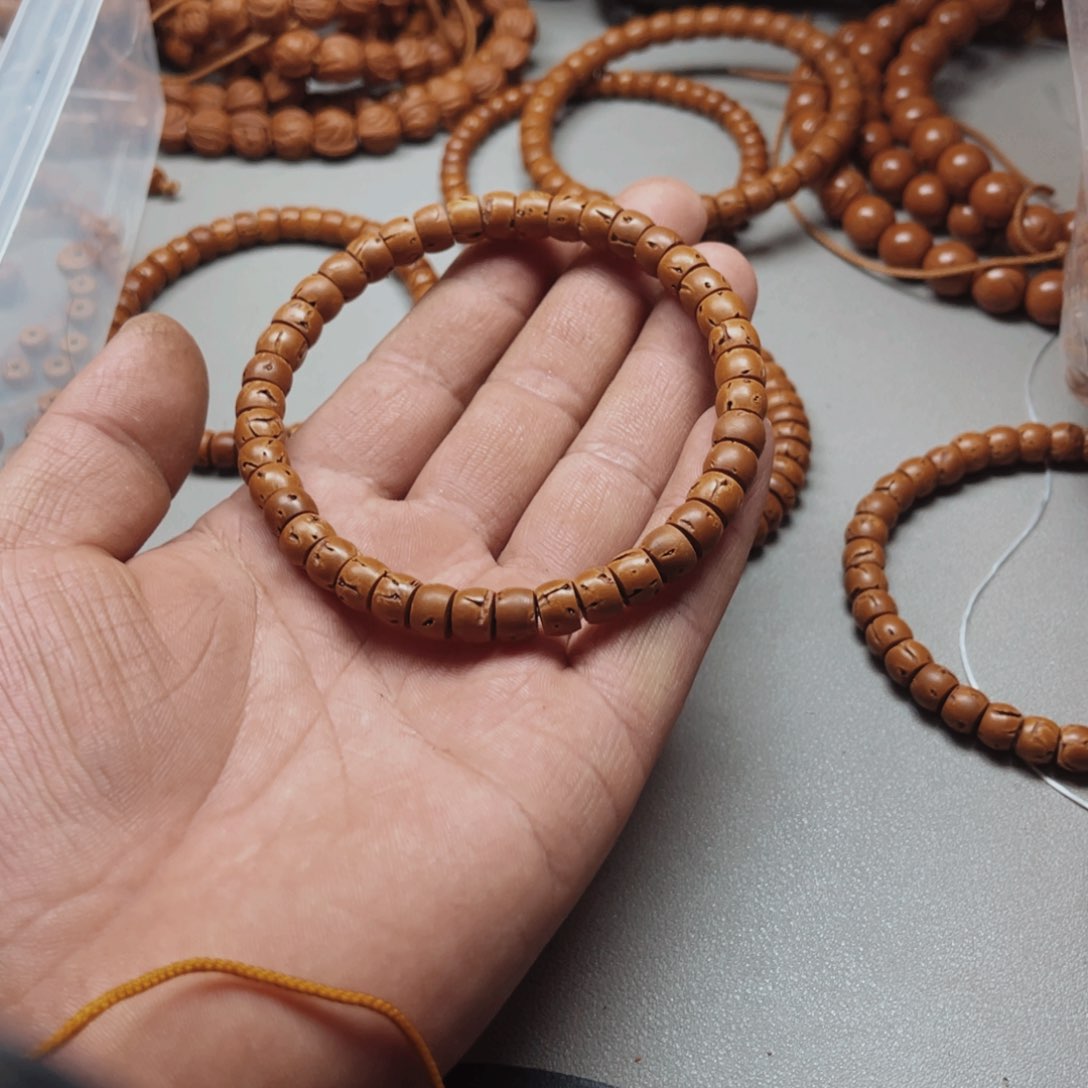 桃核吊坠囍*，唐光柱了