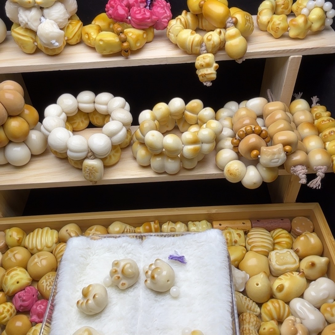 绾***心吊坠菩提根/象牙果全品