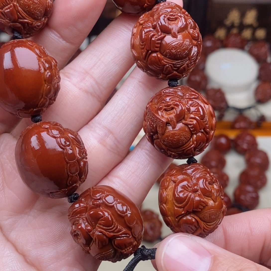 橄榄核吊坠行**疆财神财神