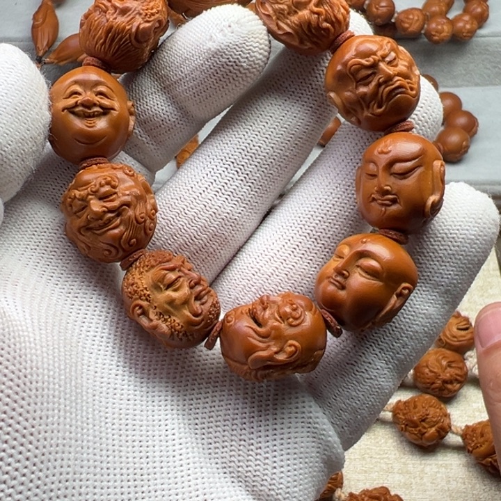 忘***忧橄榄核手串橄榄核雕工艺制作