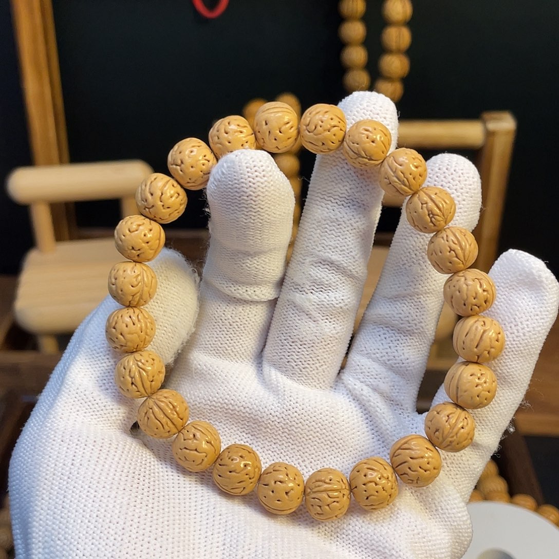 斌***你桃核手串，桃核手串