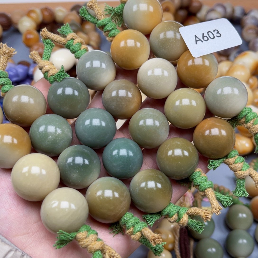 吊坠菩提根/象牙果A603圆珠20-22微瑕一串随机