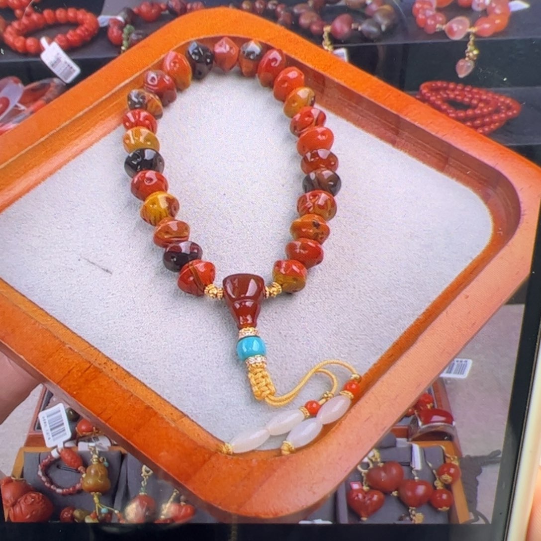 小***卡南红玛瑙未镶嵌（大山包包浆百香籽手串8-9mm