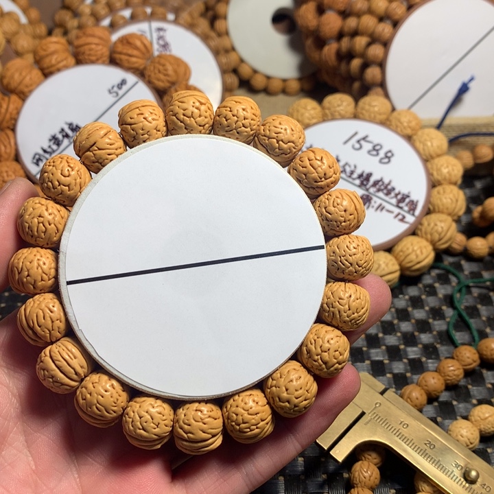 靓***爸桃核手串13#东北一号卧龙